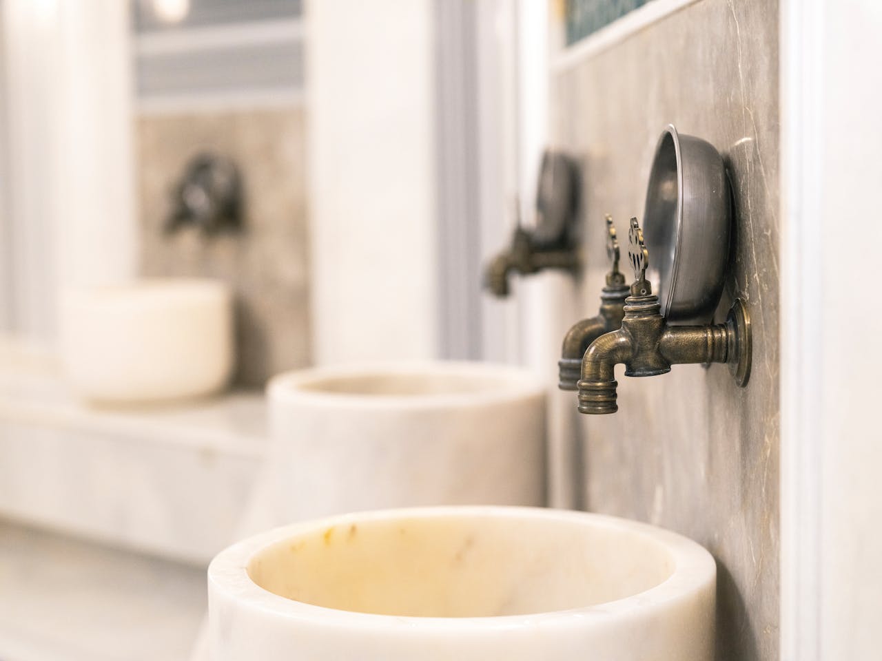 Vintage Faucets Mounted on a Wall